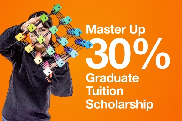 A graduate student holding a cube with text next to them that reads: Master Up 30% Graduate Tuition Scholarship.