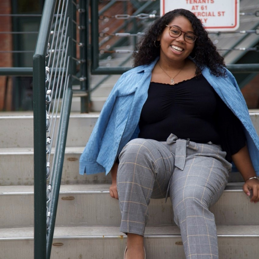 Jada Jennings sitting on steps
