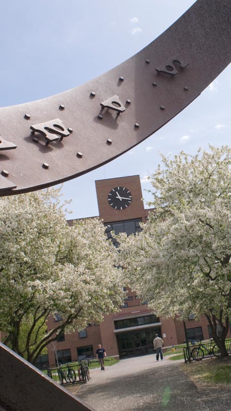 Part of a metal sculpture with a build clock