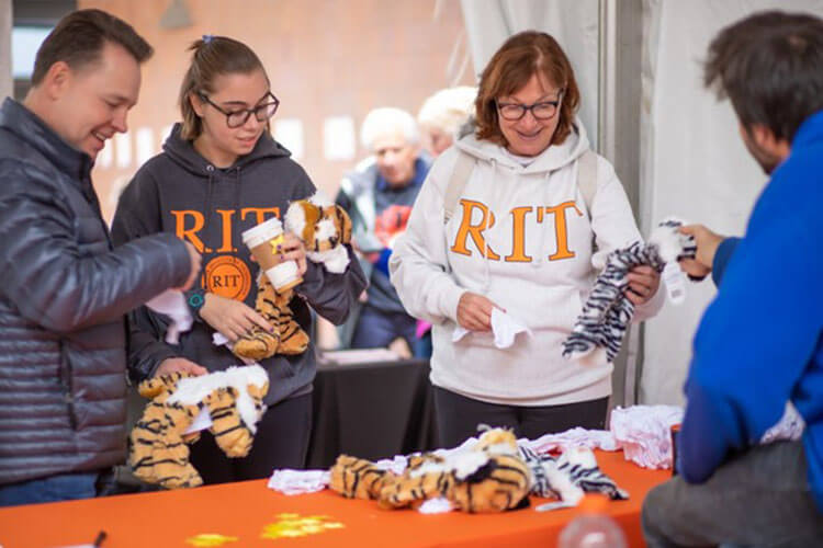 People create their own stuffed tigers during Brick City Homecoming and Family Weekend.
